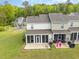 Home featuring a screened-in porch, patio, and backyard at 1105 Dinger Ct. # 1105, Myrtle Beach, SC 29588
