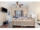Bedroom with hardwood floors, ceiling fan, natural light, and a dresser at 1105 Dinger Ct. # 1105, Myrtle Beach, SC 29588