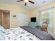 Bright bedroom with ceiling fan, closet, window and light turquoise furniture at 1105 Dinger Ct. # 1105, Myrtle Beach, SC 29588