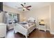 Comfortable bedroom with hardwood floors, ceiling fan, and plenty of natural light at 1105 Dinger Ct. # 1105, Myrtle Beach, SC 29588
