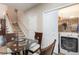 Dining area with table, stairs, laundry closet with washer and dryer at 1105 Dinger Ct. # 1105, Myrtle Beach, SC 29588