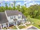 Townhome featuring landscaping, a front porch, and convenient parking at 1105 Dinger Ct. # 1105, Myrtle Beach, SC 29588
