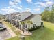 Well-maintained townhome exterior with neat landscaping, a front porch, and ample parking at 1105 Dinger Ct. # 1105, Myrtle Beach, SC 29588