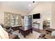 Inviting living room featuring hardwood floors, lots of seating, and a view of the entryway at 1105 Dinger Ct. # 1105, Myrtle Beach, SC 29588