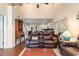 Cozy living room with high ceilings, open to kitchen, hardwood floors, and ample seating at 1105 Dinger Ct. # 1105, Myrtle Beach, SC 29588