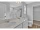 Bathroom featuring double sinks, quartz counters and walk-in shower at 1106 Cherrystone Loop, Conway, SC 29526