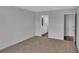 Bedroom showcasing plush carpeting, neutral walls and an ensuite bath at 1106 Cherrystone Loop, Conway, SC 29526