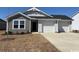 Well-manicured one story home featuring a two-car garage, and a traditional design at 1106 Cherrystone Loop, Conway, SC 29526