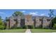 Grand exterior elevation features manicured landscaping, and a stone exterior at 1106 Cherrystone Loop, Conway, SC 29526