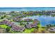 Picturesque aerial view of a waterfront neighborhood with a serene lake and beautiful landscaping throughout the community at 112 Spartina Ct. # 26, Pawleys Island, SC 29585