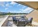 Relaxing balcony view with comfortable outdoor seating overlooking the water at 112 Spartina Ct. # 26, Pawleys Island, SC 29585