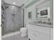 Stylish bathroom features a glass-enclosed shower with marble walls, modern fixtures, and vanity at 112 Spartina Ct. # 26, Pawleys Island, SC 29585
