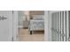 Inviting bedroom with a cozy bed, side table, and neutral color palette at 112 Spartina Ct. # 26, Pawleys Island, SC 29585