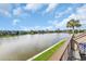 Gorgeous lake view from the patio, surrounded by lush greenery and community homes at 112 Spartina Ct. # 26, Pawleys Island, SC 29585
