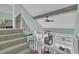 Stairwell overlooking the home's open living space with an abundance of natural light at 112 Spartina Ct. # 26, Pawleys Island, SC 29585