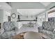 Inviting living room showcasing open floorplan, modern kitchen, and comfortable seating at 112 Spartina Ct. # 26, Pawleys Island, SC 29585