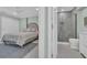 Serene main bedroom featuring an ensuite bathroom with a modern glass-enclosed shower at 112 Spartina Ct. # 26, Pawleys Island, SC 29585