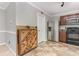 Efficient kitchen with a stainless steel refrigerator and rustic wood accent wall at 113 Winding Path Dr., Loris, SC 29569
