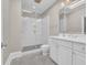 Bright bathroom featuring a glass enclosed shower and a double sink vanity at 115 Harbor Club Dr. # 4A, Pawleys Island, SC 29585