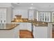 Bright kitchen featuring granite countertops, tile backsplash, and stainless steel appliances at 115 Harbor Club Dr. # 4A, Pawleys Island, SC 29585