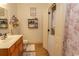 Comfortable bathroom featuring a vanity, toilet, and a stackable washer and dryer unit at 118 Ella Kinley Circle # 404, Myrtle Beach, SC 29588