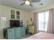 Bedroom featuring a full size bed, dressers, and ceiling fan at 118 Ella Kinley Circle # 404, Myrtle Beach, SC 29588