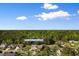 An aerial view shows the roof and landscaping of the home at 120 Carolina Crossing Blvd at 120 Carolina Crossing Blvd., Little River, SC 29566