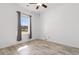 Well-lit bedroom with hardwood floors, ceiling fan and a window at 120 Carolina Crossing Blvd., Little River, SC 29566