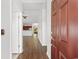 Inviting entryway with hardwood floors, and views into the kitchen and dining area, creating a warm and open feel at 120 Carolina Crossing Blvd., Little River, SC 29566