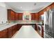 Spacious kitchen featuring updated appliances, plenty of storage, and a large island, creating an inviting cooking space at 120 Carolina Crossing Blvd., Little River, SC 29566
