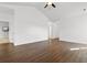 Open living room featuring vaulted ceilings, hardwood floors, and plenty of natural light at 120 Carolina Crossing Blvd., Little River, SC 29566