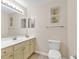Neutral bathroom with a large mirror, vanity with storage, and tile floors at 145 Stonegate Blvd. # 145, Murrells Inlet, SC 29576