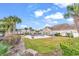 Inviting community pool with ample seating, lush lawn, and palm trees at 145 Stonegate Blvd. # 145, Murrells Inlet, SC 29576