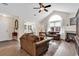 Inviting living room with fireplace, hardwood floors, and ample seating at 145 Stonegate Blvd. # 145, Murrells Inlet, SC 29576