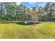 Picturesque pond and fountain with surrounding mature trees and shrubs at 145 Stonegate Blvd. # 145, Murrells Inlet, SC 29576