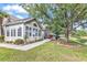 Bright sun room addition with plenty of windows and a picturesque view of the green lawn and waterfront at 145 Stonegate Blvd. # 145, Murrells Inlet, SC 29576