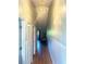 Hallway with a decorative chandelier and doors, creating an inviting ambiance at 1450 Blue Tree Ct. # I, Myrtle Beach, SC 29588