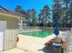 Community pool with ample seating, perfect for relaxation and social gatherings at 1450 Blue Tree Ct. # I, Myrtle Beach, SC 29588