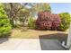 Spacious backyard with mature trees and plants at 1512 Hallborough Dr., Surfside Beach, SC 29575