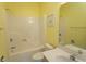 Bright bathroom featuring a tub and shower combo with a vanity and sink at 1512 Hallborough Dr., Surfside Beach, SC 29575