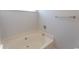 Bright soaking tub with clean neutral decor at 1512 Hallborough Dr., Surfside Beach, SC 29575