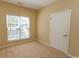 Bedroom with neutral carpet and a window with blinds at 1512 Hallborough Dr., Surfside Beach, SC 29575