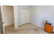 Neutral bedroom featuring carpet, a closet, and a side table with décor at 1512 Hallborough Dr., Surfside Beach, SC 29575