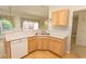 A kitchen showcasing wood cabinets, a built-in dishwasher, and an open design that promotes easy interaction at 1512 Hallborough Dr., Surfside Beach, SC 29575