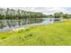 Scenic view of a calm pond surrounded by lush greenery at 1512 Hallborough Dr., Surfside Beach, SC 29575