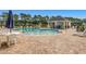 Community pool with a spacious patio area, lounge chairs, picnic tables, and gazebo at 168 Zostera Dr., Little River, SC 29566