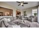 Bright sunroom featuring casual furniture, large windows, and neutral decor at 168 Zostera Dr., Little River, SC 29566