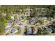 Aerial view of a residential neighborhood with tree-lined streets and well-maintained homes at 174 Sussex Ct., Longs, SC 29568
