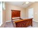 Bedroom with carpeted floors, a vaulted ceiling with fan, and a window providing natural light at 174 Sussex Ct., Longs, SC 29568