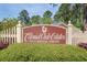 Colonial Club Estates community sign amidst lush greenery at 174 Sussex Ct., Longs, SC 29568
